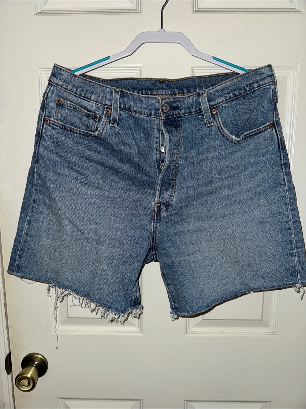 Levi's Medium Blue Raw Hem Denim Cutoff Shorts
